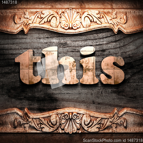 Image of Golden word on wood