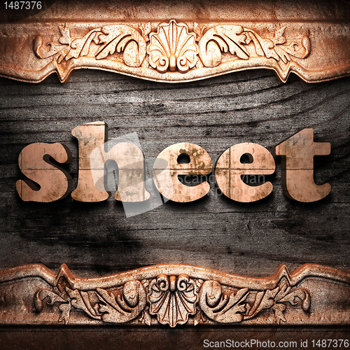 Image of Golden word on wood
