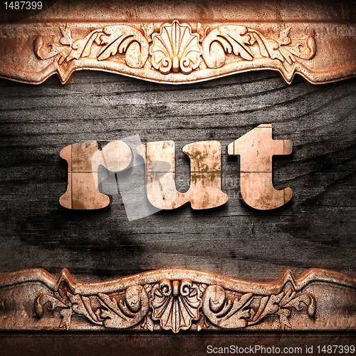 Image of Golden word on wood