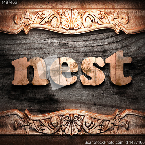 Image of Golden word on wood