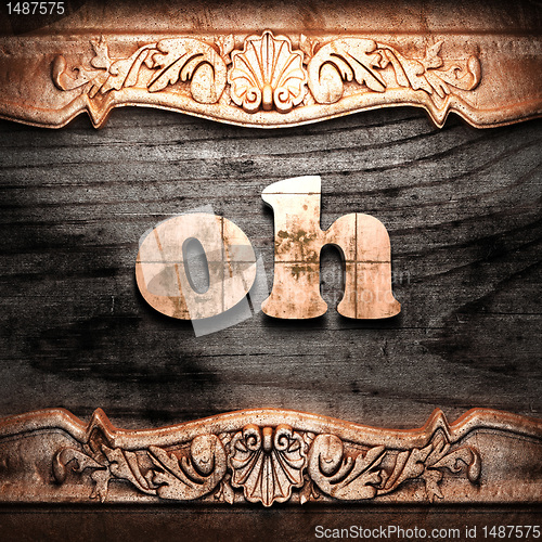 Image of Golden word on wood