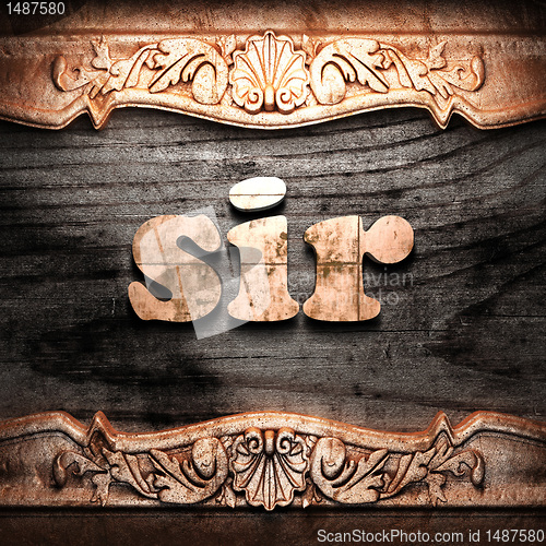 Image of Golden word on wood