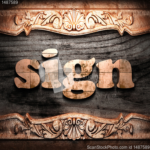 Image of Golden word on wood