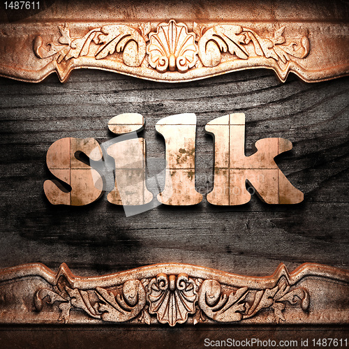 Image of Golden word on wood