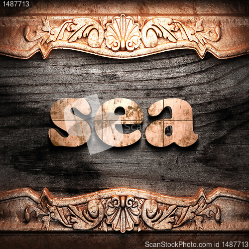 Image of Golden word on wood