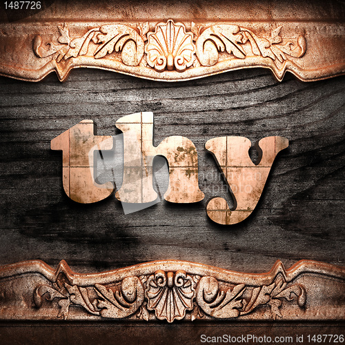 Image of Golden word on wood