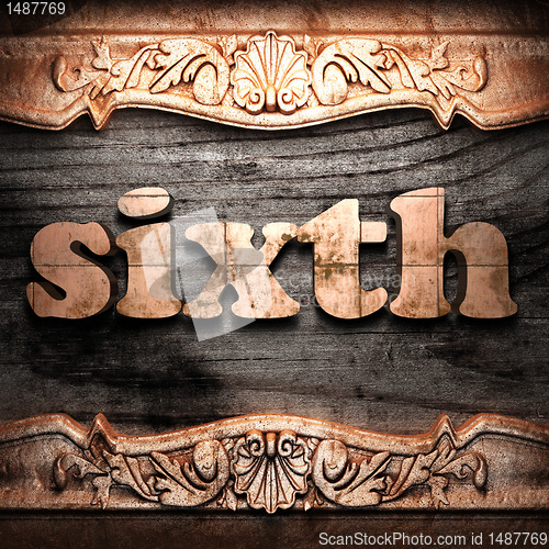 Image of Golden word on wood