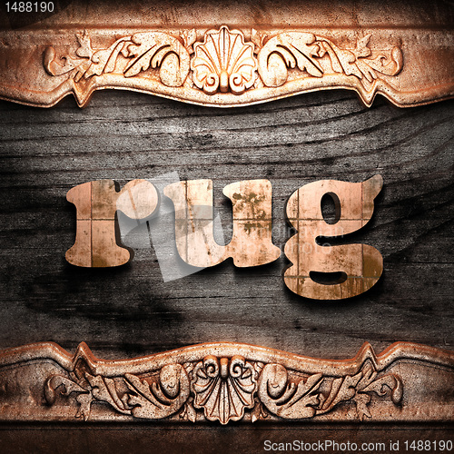 Image of Golden word on wood