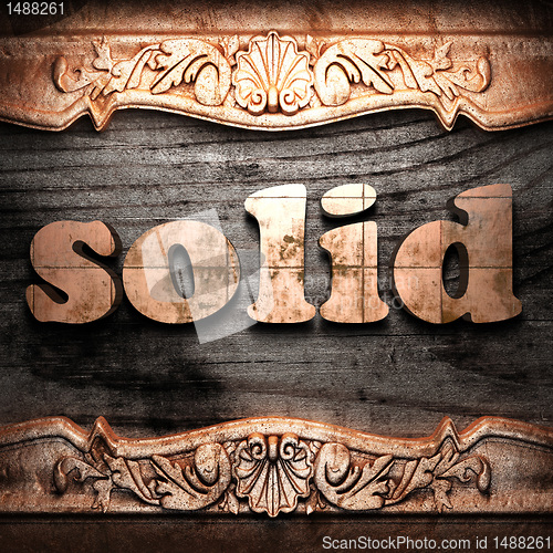 Image of Golden word on wood