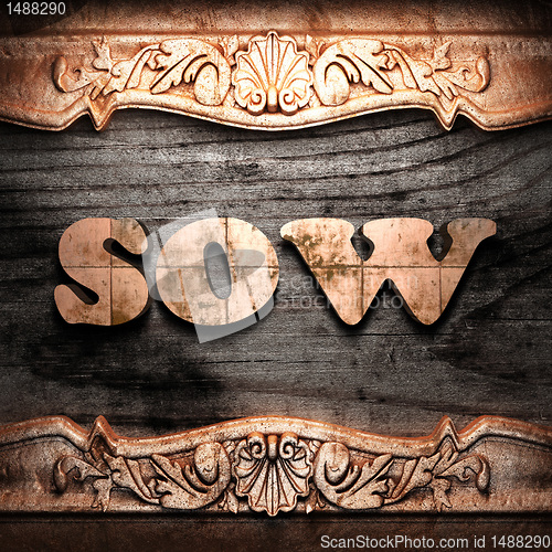 Image of Golden word on wood