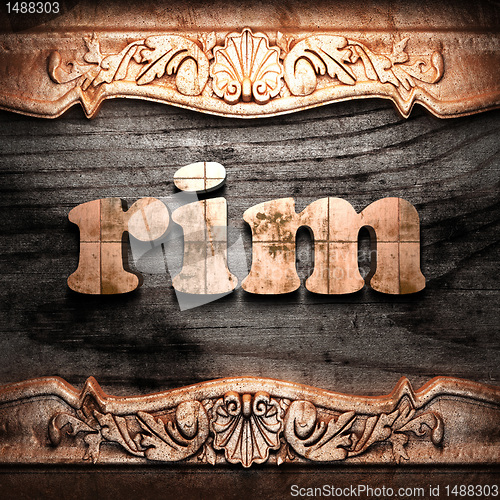Image of Golden word on wood