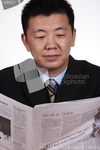 Image of Asian Businessman Reading