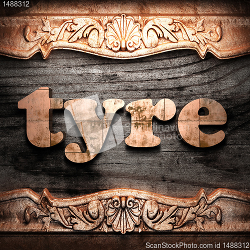 Image of Golden word on wood