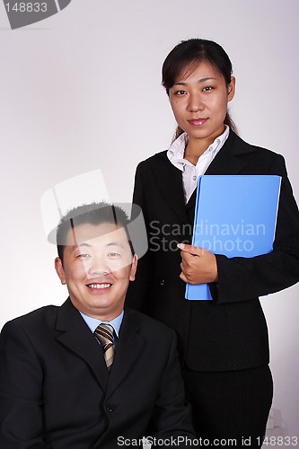 Image of Asian Executive and Secretary