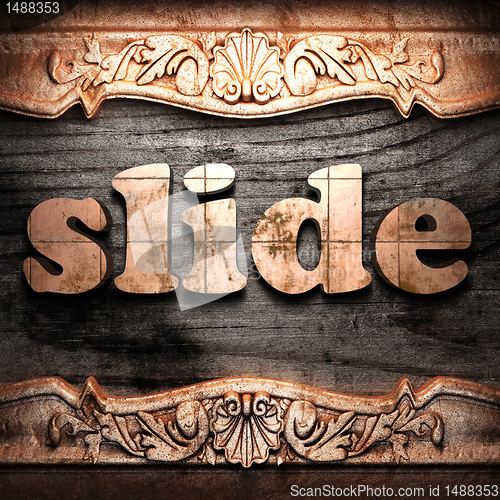 Image of Golden word on wood