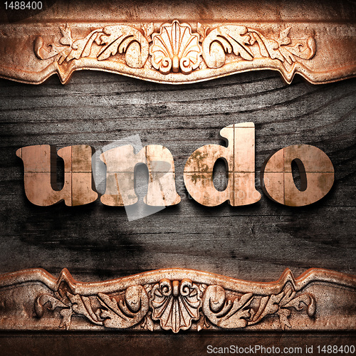 Image of Golden word on wood