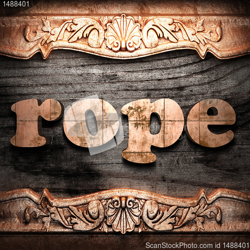 Image of Golden word on wood