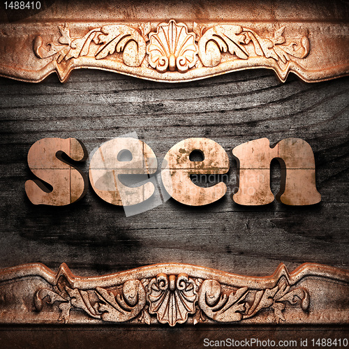 Image of Golden word on wood
