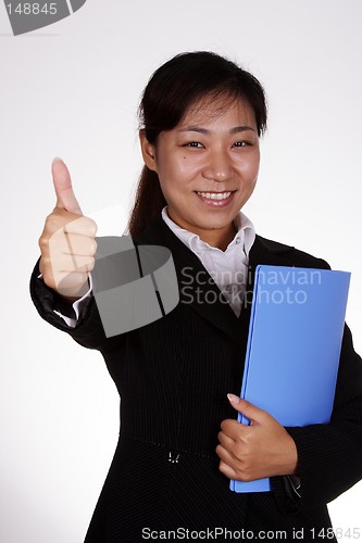 Image of Business woman with thumbs up