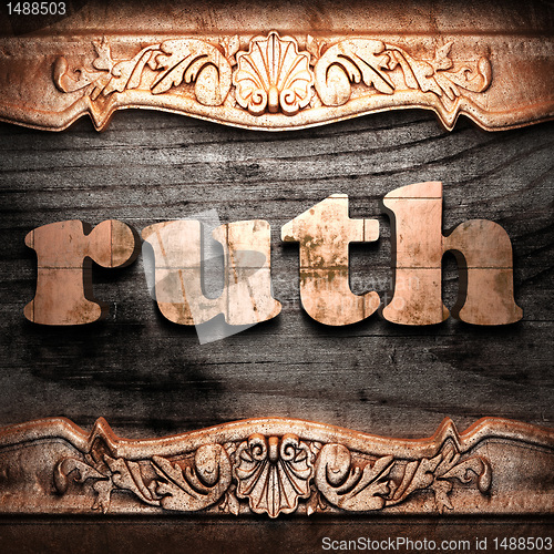 Image of Golden word on wood