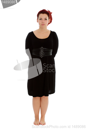 Image of Young girl in black dress on white backgroung