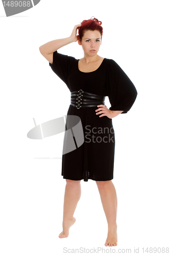 Image of Young girl in black dress on white backgroung