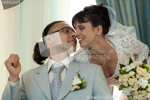 Image of The bride and groom in the boudoir