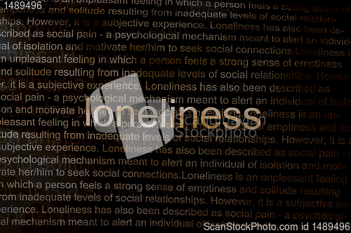 Image of Typed text Loneliness on paper