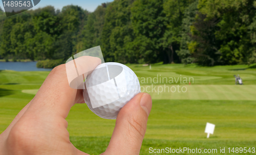 Image of Hand With Golf Ball