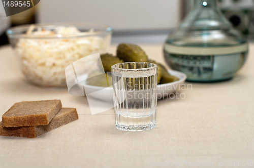 Image of Vodka and snack.