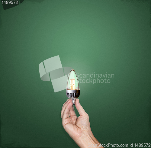 Image of Bright idea LED lightbulb in hand