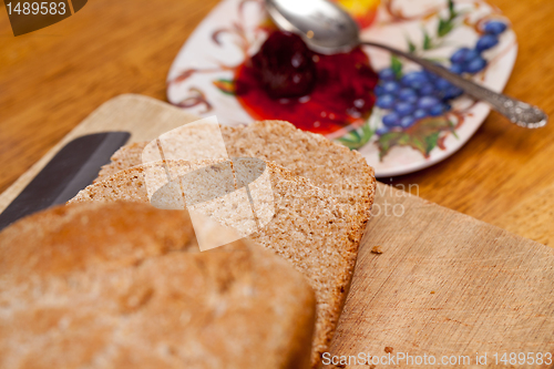 Image of Sliced wheat bread and jam
