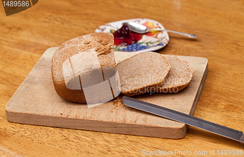 Image of Sliced wheat bread and jam