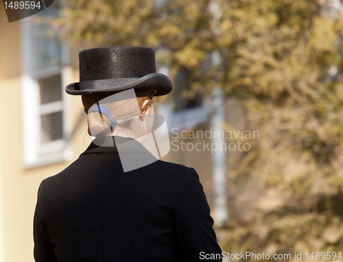 Image of Kentucky riding hat on lady