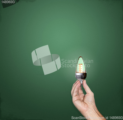 Image of Bright idea LED lightbulb in hand