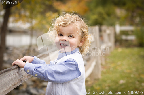 Image of Adorable Young Boy Playing Outside