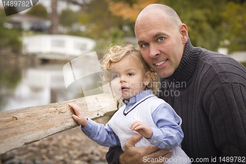 Image of Handsome Father and Son in the Park