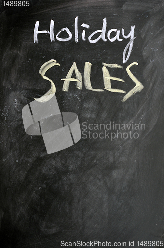 Image of Holiday sales written on a blackboard