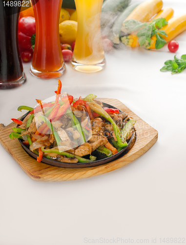 Image of original fajita sizzling hot  on iron plate