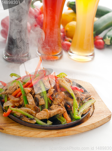 Image of original fajita sizzling hot  on iron plate