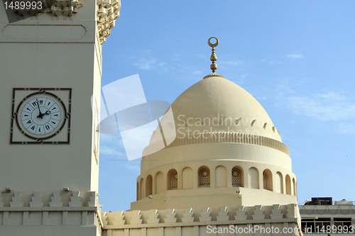 Image of Clock and minaret