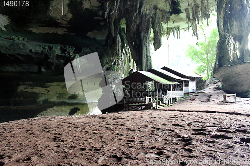 Image of Wooden house in cave