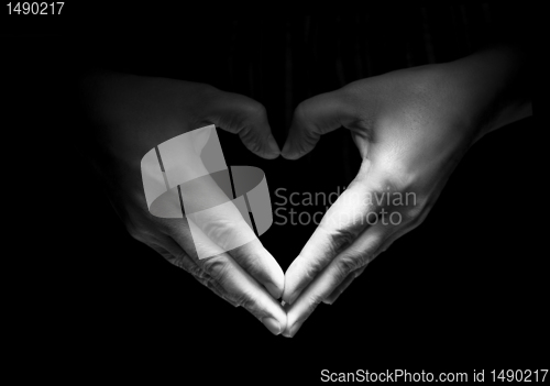 Image of Hands unite with eachother in love symbol
