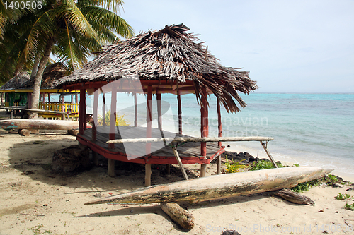 Image of Huts and boat