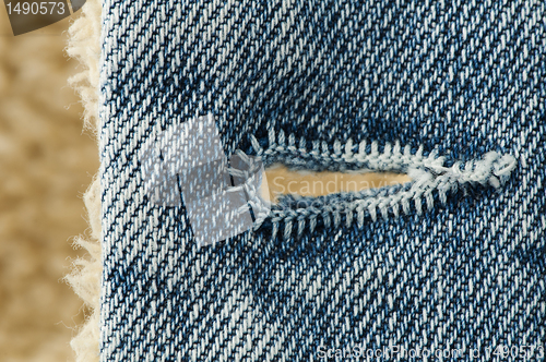 Image of Buttonhole of jeans cloth