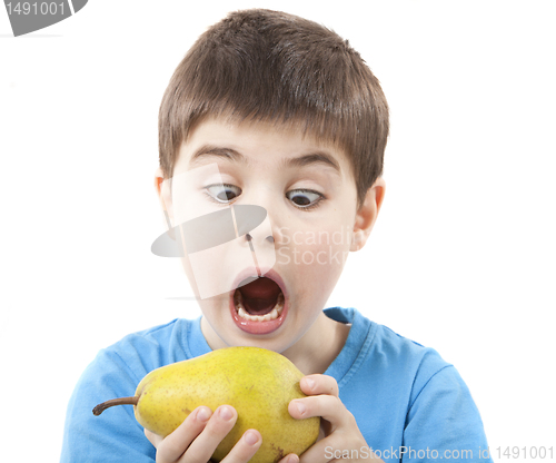 Image of Child eating a pear