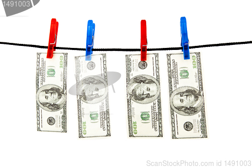 Image of Dollars hanging on a rope