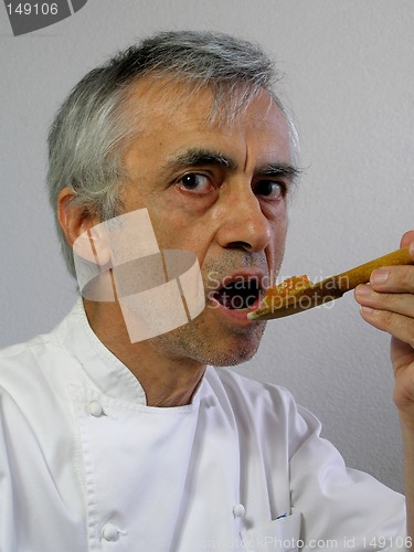 Image of The chef is tasting