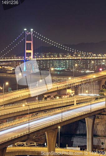 Image of highway and bridge at night