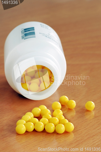 Image of Yellow dragee pills